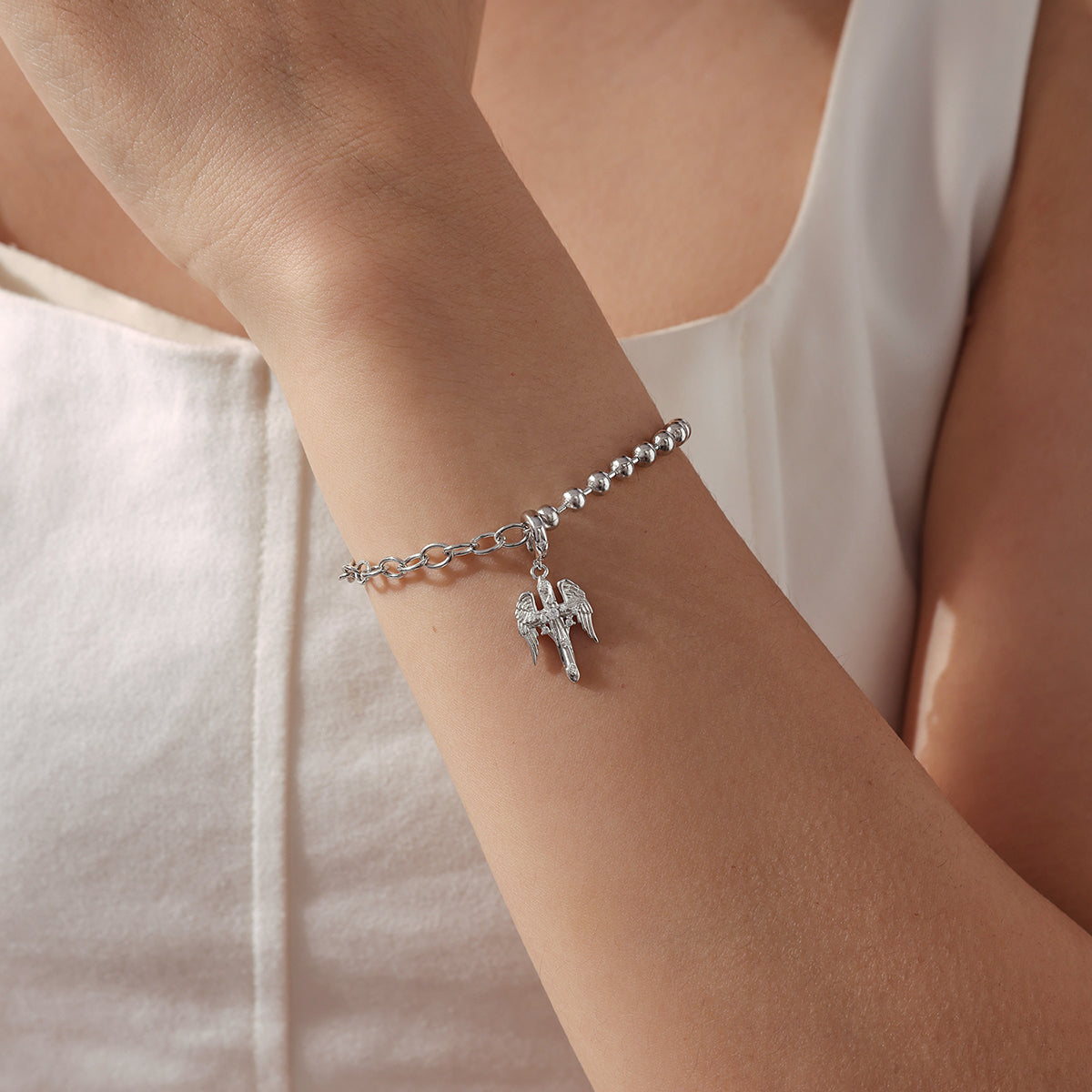 Winged Cross Charm